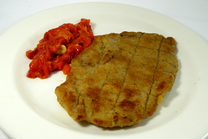 Grilled veal escalope with red pepper stew