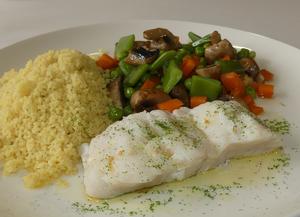 Steamed hake with couscous and vegetables