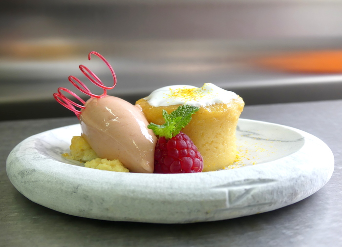 Sponge cake soaked in three different style milk with guava sherbet and  spiral-shaped caramel (TAPA)