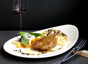 Duck thigh confit with fresh pasta and mediterranean salad