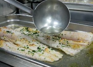 Braised hake  with tomatoes