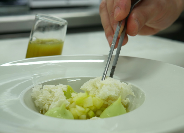Different textures of granny smith apple, gin, wasabi, basil cream and yogurt (Pintxo)