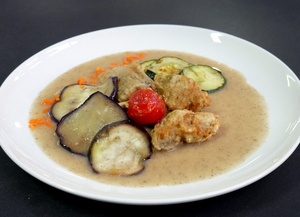 Panaché of battered vegetables with champignon mushroom sauce