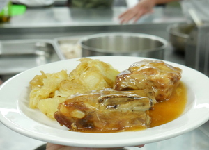 Roasted pork ribs with baked potatoes