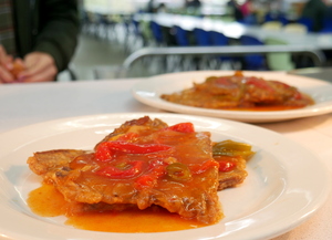 Simmered and buttered veal with piperrada (green and red pepper stew)