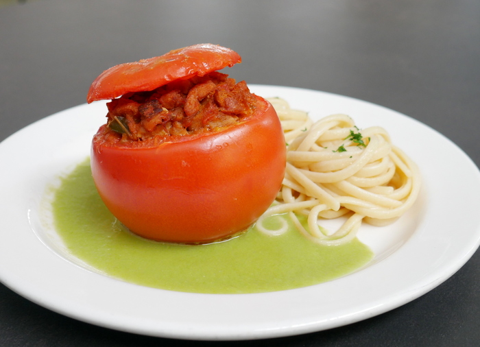 Stuffed tomatoes and pasta