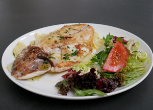 Roasted gilt-head bream with golden potato rounds