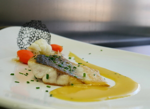 Roasted sea bass with saffron sauce