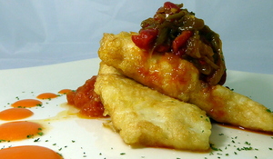 Battered hake with piperrada (roasted green peppers, fried red peppers, onion, garlic and tomato)