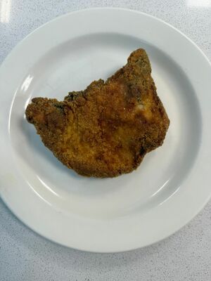 Chuleta de cerdo empanada