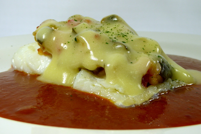 Cod confit with pisto (Onion, green pepper, tomato and courgette stew) and Biscayne sauce