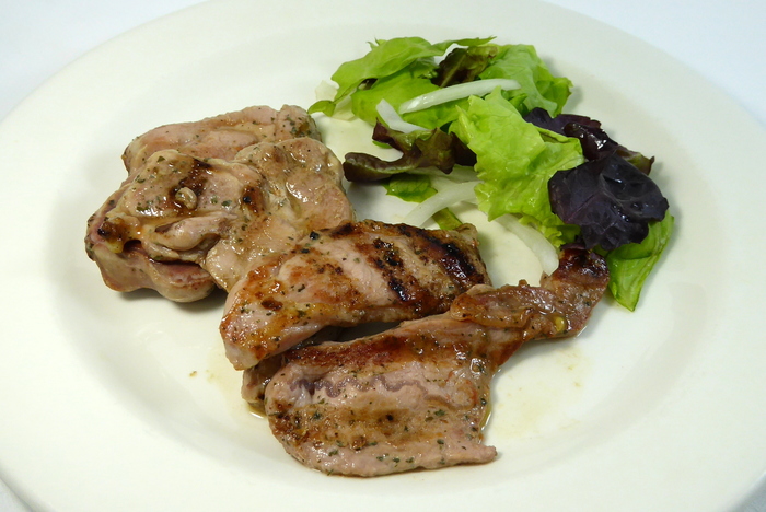 Grilled turkey chop with lettuce salad