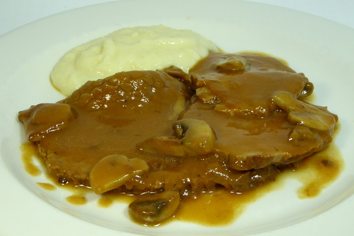 Braised veal and mushroom stew with mashed