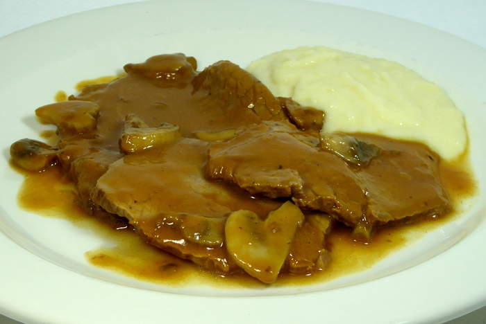 Braised veal and mushroom stew with mashed