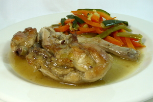 Rabbit seasoned with mustard stew and garnished with mixed vegetables 