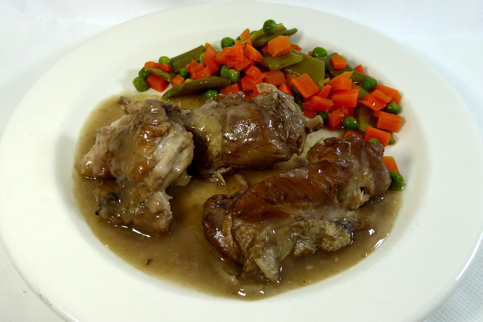 Chicken ragout in red wine and vegetables