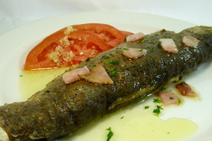 Fried trout with tomato salad