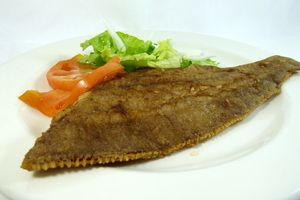 Fried flounder with salad