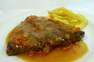 Larded veal steak with french fries