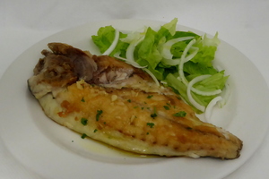 Grilled gilt–head bream with lettuce salad 