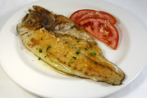 Grilled gilt-head bream with tomato and garlic salad