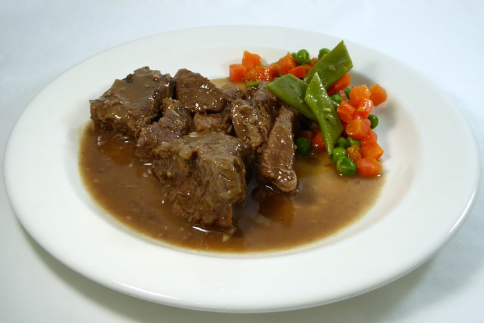 Veal fricassee with chilli and diced vegetables