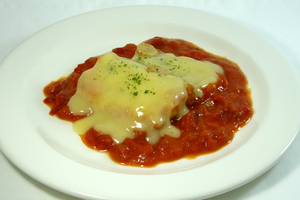 Bacalao en salsa de tomate y pimientos