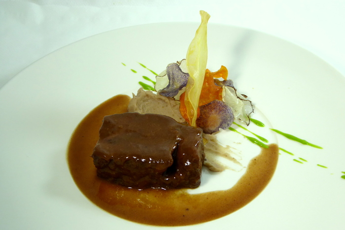 Braised veal cheeks with chestnut purée and vegetable chips