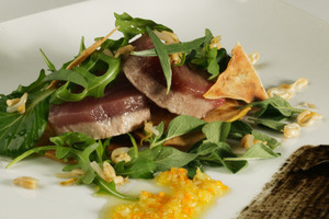 Warm marinated albacore salad with citrus fruits vinaigrette