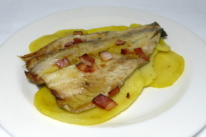 Roasted trout with golden potato rounds