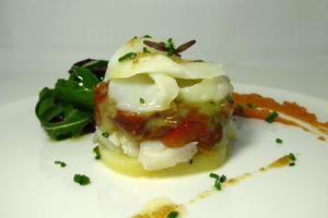 Cod cake with piperrada (roasted green peppers stew)