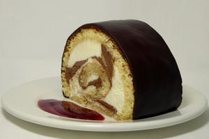 Truffle and whipped cream sponge cake roll