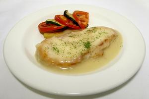 Roasted chicken breast in brown garlic sauce