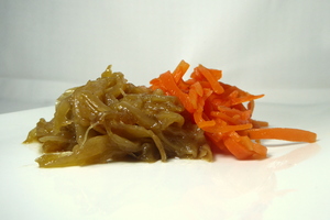 Glazed onion and carrots in julienne