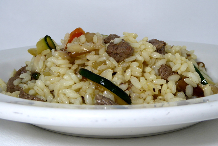 Sauteed rice with veal and vegetables