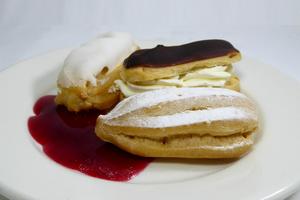 Éclairs filled with  patissiere cream and whipped cream