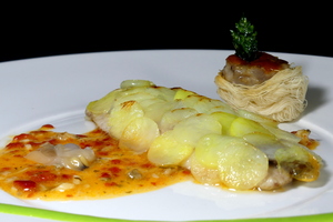 Mackerel fillets covered with potato flakes