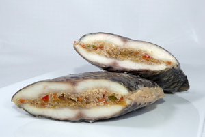Organic tilapia stuffed with quinoa and vegetables with mussels sauce