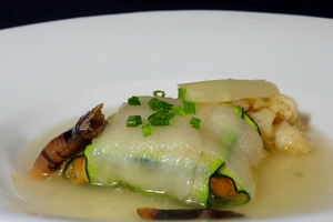 Courgette, mussels, mushrooms and shellfish consommé raviolis