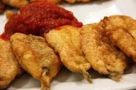 Battered anchovies filled with roasted green and red peppers