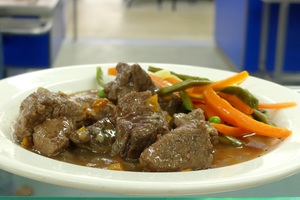 Beef bourguignon with mixed vegetable sticks
