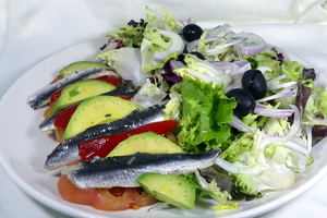 Avocado, piquillo green pepper and marinated anchovy salad