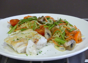 Grilled haddock with pasta and vegetables wok